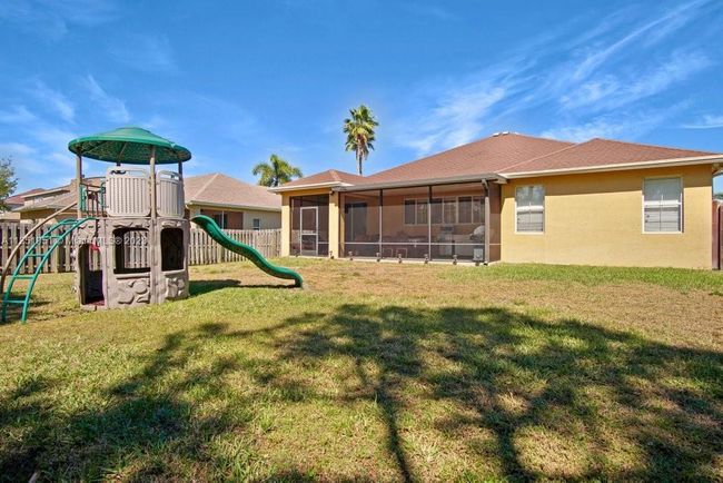 5806 Nw Breezy Brook Ct, House other with 3 bedrooms, 2 bathrooms and null parking in Port St. Lucie FL | Image 35