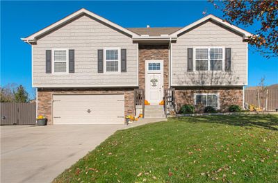 14278 S Landon Street, Condo with 4 bedrooms, 3 bathrooms and null parking in Olathe KS | Image 1