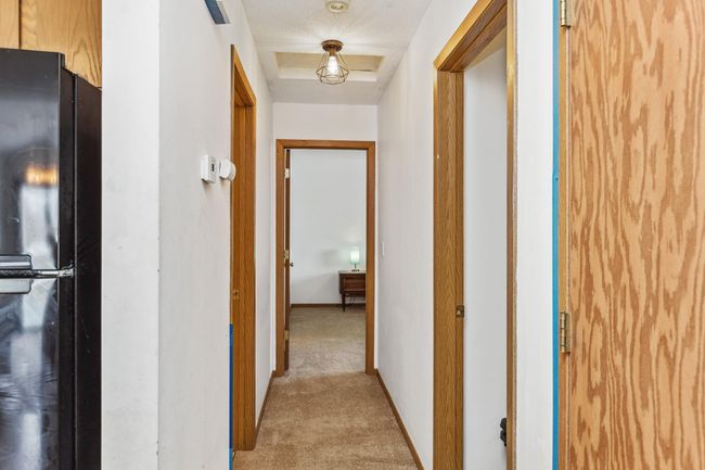 Hallway to 2 bedrooms and full bathroom | Image 10