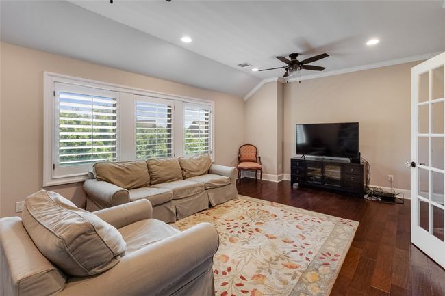 Living area featuring ceiling fan, recessed lighting, ornamental molding, baseboards, and dark wood-style floors | Image 18