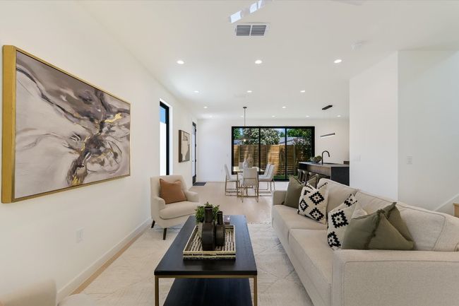 Living room with recessed lighting and baseboards | Image 9