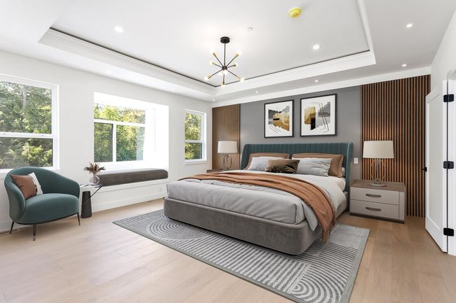 Bedroom featuring a chandelier, ornamental molding, recessed lighting, wood finished floors, and a raised ceiling | Image 15