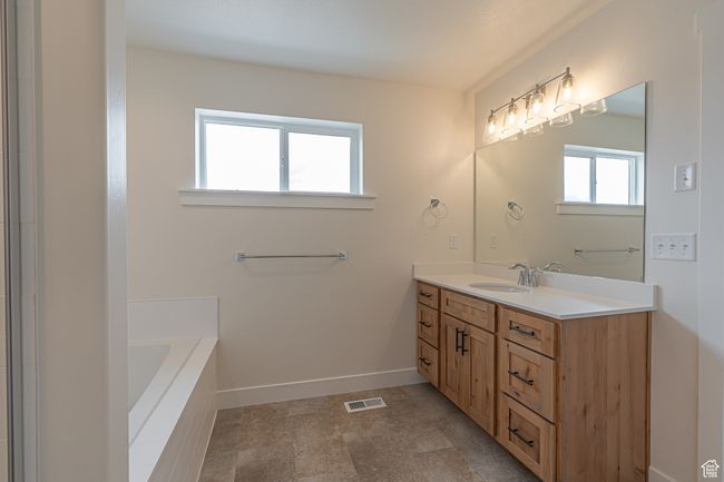 Full bath with vanity and a bath | Image 20