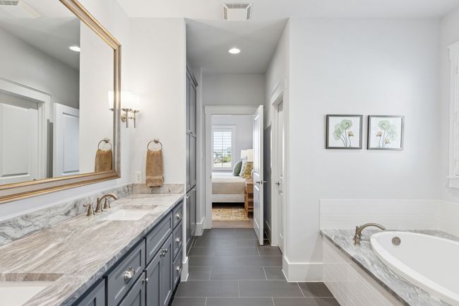 Full bathroom with tile patterned flooring, a sink, connected bathroom, visible vents, and double vanity | Image 21