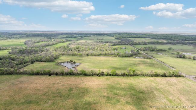 View of rural area with a large body of water | Image 42