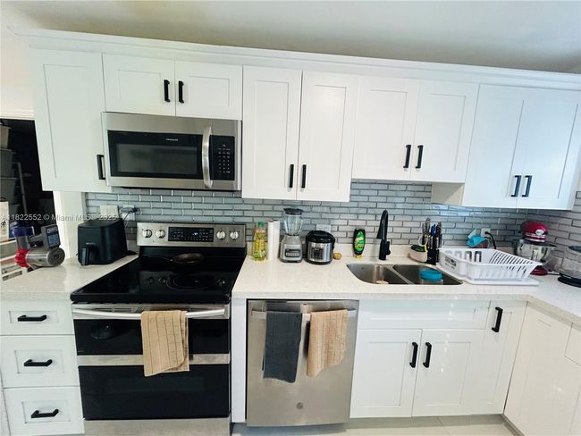 2376 Nw 55 Th St, House other with 4 bedrooms, 2 bathrooms and null parking in Miami FL | Image 6