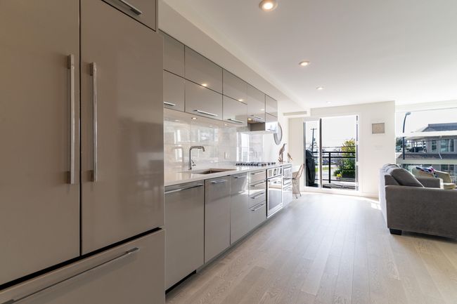 Living room featuring baseboards, recessed lighting, and light wood-style floors | Image 4