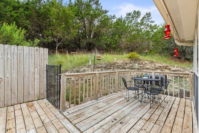 Wooden terrace with outdoor dining area | Image 34