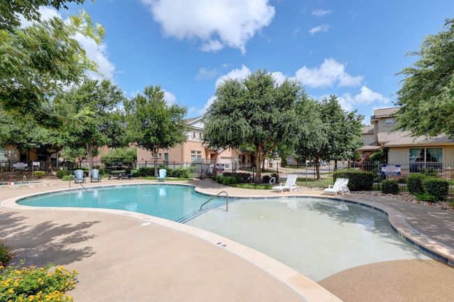 Pecan Park Garden Estates residents enjoy the security of a gated entrance and a sparkling pool ideal for summer refreshment. | Image 31
