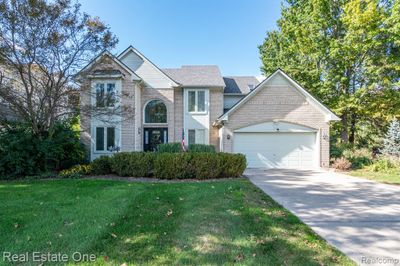 1398 N Creek Drive, Home with 3 bedrooms, 2 bathrooms and null parking in Wixom MI | Image 1