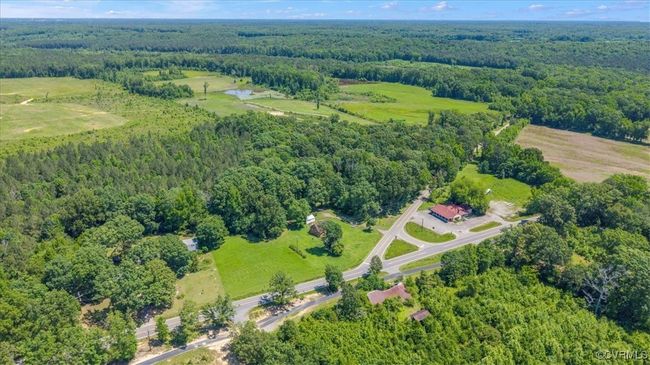 View of property location featuring a forest | Image 6