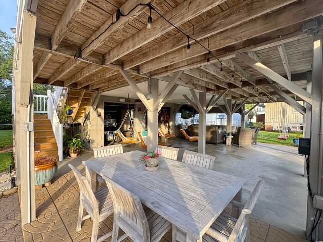 View of patio / terrace with stairs and outdoor dining area | Image 11