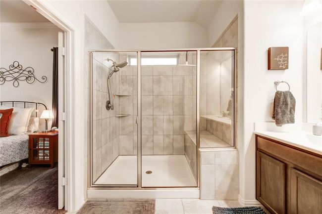 Primary bathroom with two sinks and large walk-in shower | Image 28