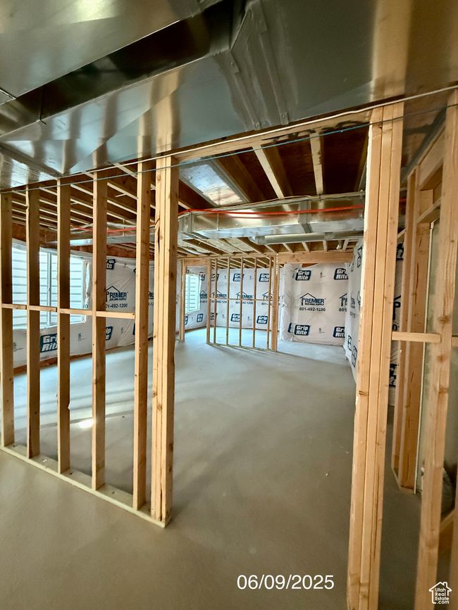 Misc room with concrete flooring | Image 15