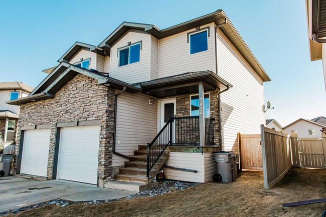 7029 112 Street, Home with 3 bedrooms, 1 bathrooms and 3 parking in Grande Prairie AB | Image 2