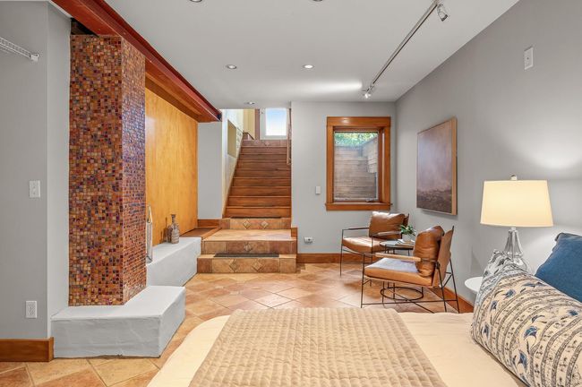 The staircase was intentionally built extra wide when this addition was put on to make it easier moving things downstairs. | Image 39