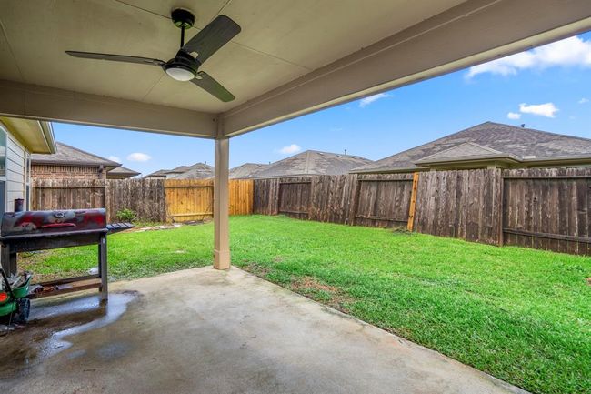 The backyard from the covered patio. | Image 39