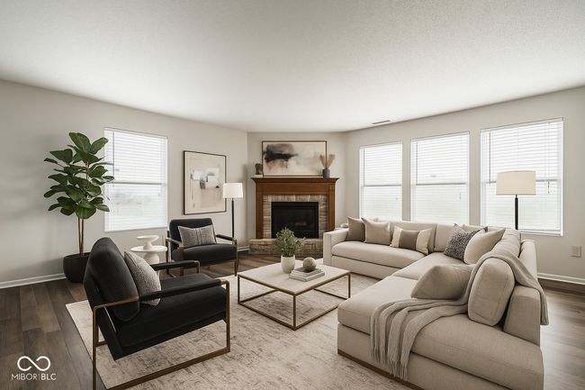 Family room with brick fireplace virtually staged | Image 8