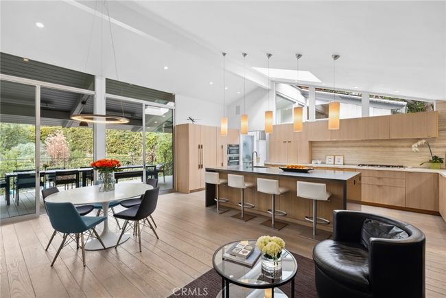 Just three blocks from the sand, this newly renovated Mid-Century Modern masterpiece blends period-perfect character with modern-day amenities in approximately 2, 837 square feet. | Image 4