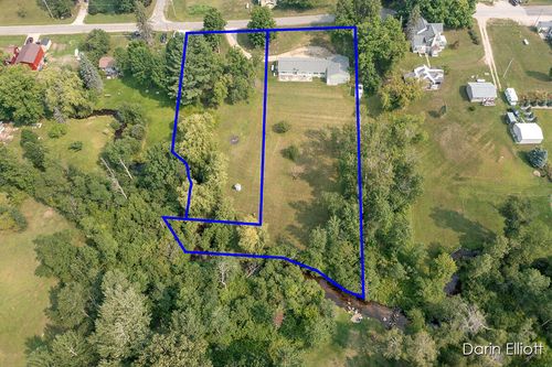 511 Maple St, Luther, MI, 49656-5118 | Card Image