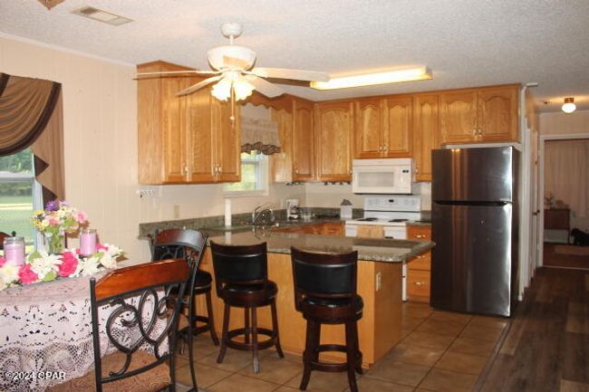 6562 Messer Rd, House other with 3 bedrooms, 2 bathrooms and null parking in Grand Ridge FL | Image 27