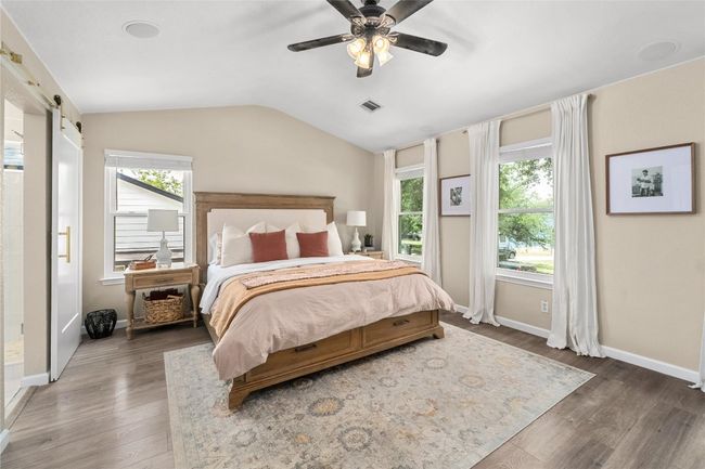 Large primary bedroom with high ceilings and wired for sound. | Image 12