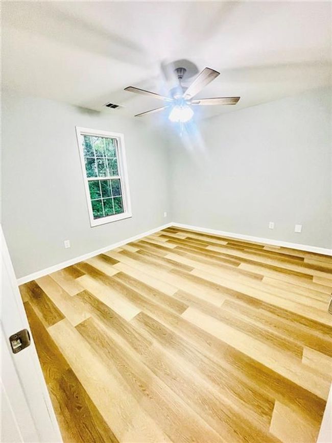 7675 Lanier View Rdg, House other with 3 bedrooms, 2 bathrooms and 2 parking in Cumming GA | Image 35