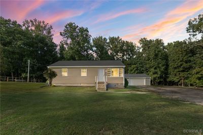 View of front of the house with a yard | Image 1