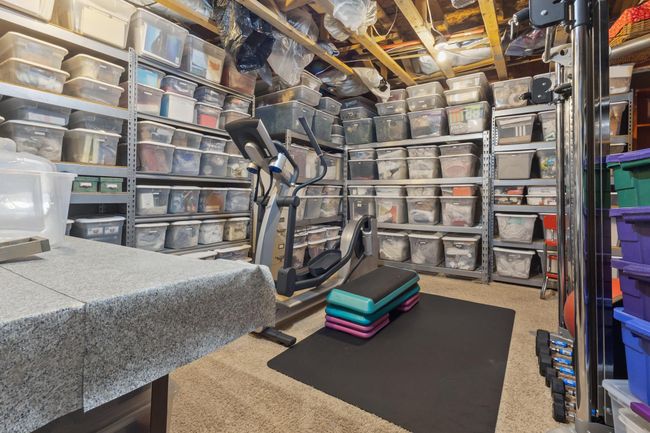 Expansive storage room also used as a workout room. | Image 18