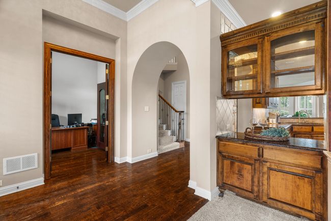 Entry, office on left and dining room with serving bar on right. | Image 5