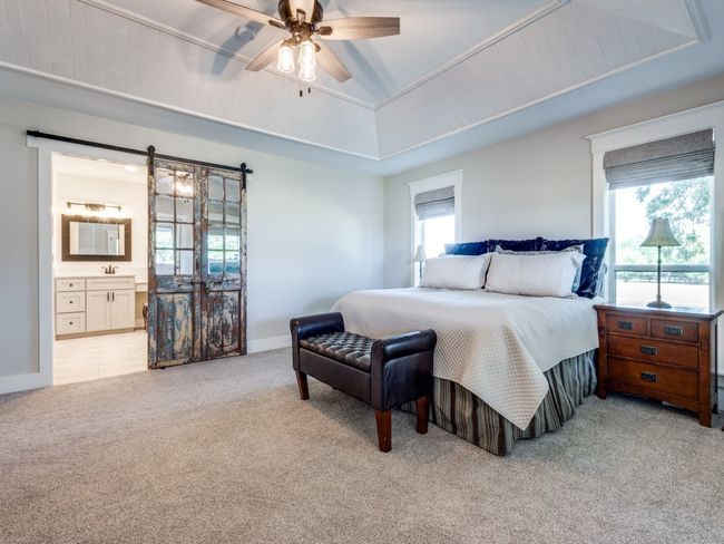 Antique doors leads you into the oversized, ensuite master bath. | Image 15