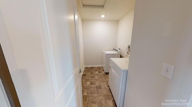 Upper level laundry room. | Image 20
