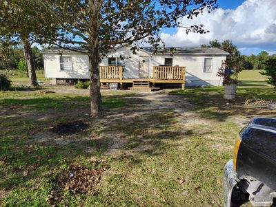 9851 Ne 60 St, Home with 3 bedrooms, 2 bathrooms and null parking in Bronson FL | Image 1