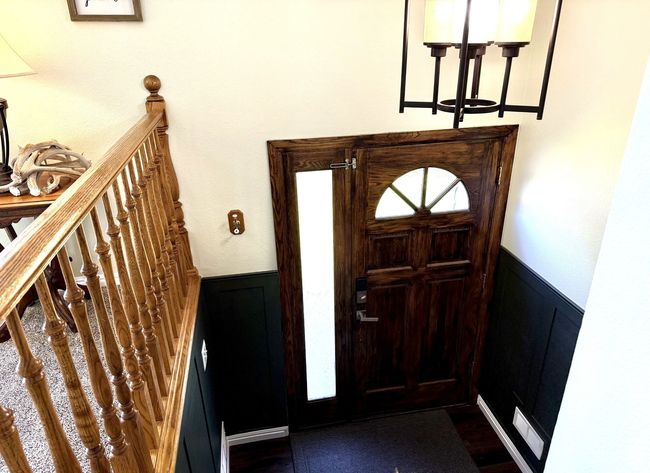 Welcoming Foyer with a wainscoted wall. | Image 4