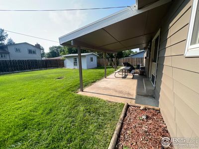 Large fenced yard with sprinklers | Image 3