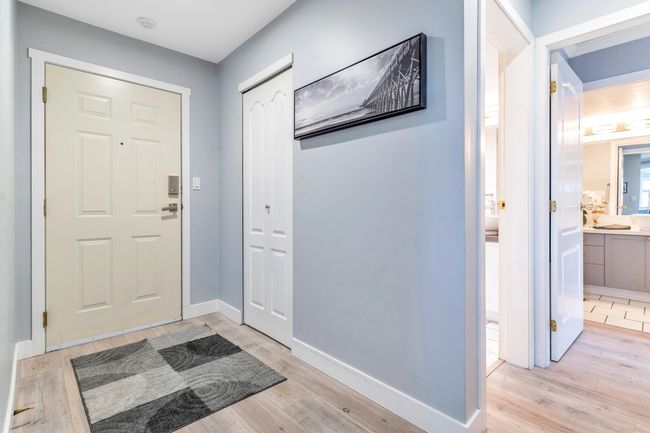 Foyer featuring baseboards and light wood finished floors | Image 24