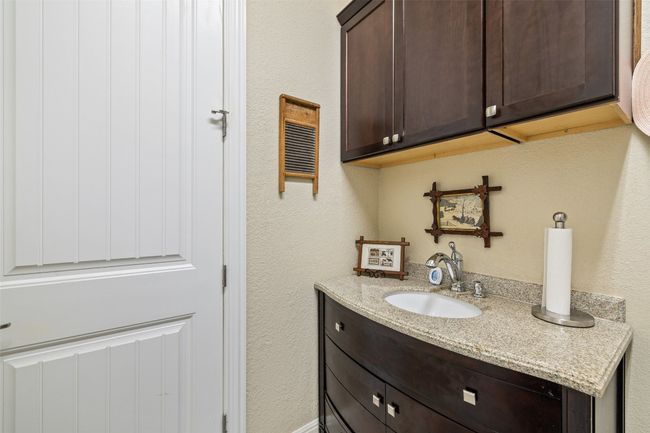 A convenient sink in the laundry room makes caring for delicate items effortless | Image 36