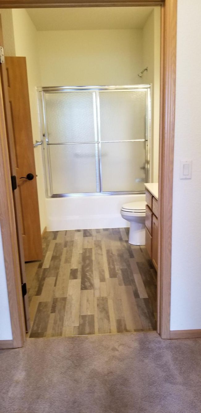 Bathroom with ample storage. | Image 8