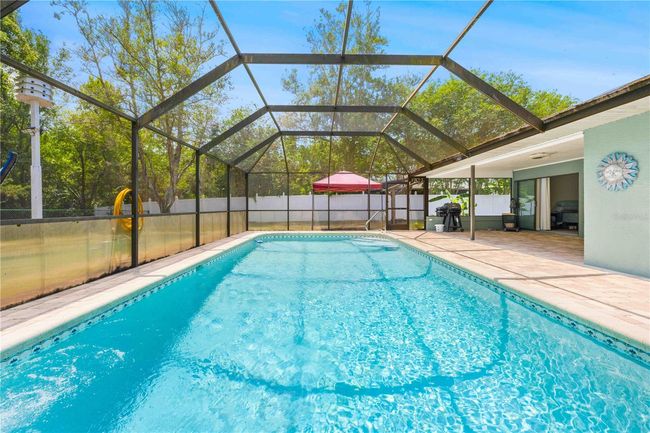 7660 Holiday Dr, House other with 4 bedrooms, 3 bathrooms and null parking in Spring Hill FL | Image 10