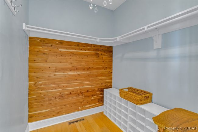 Walk-in closet in primary bedroom! | Image 26