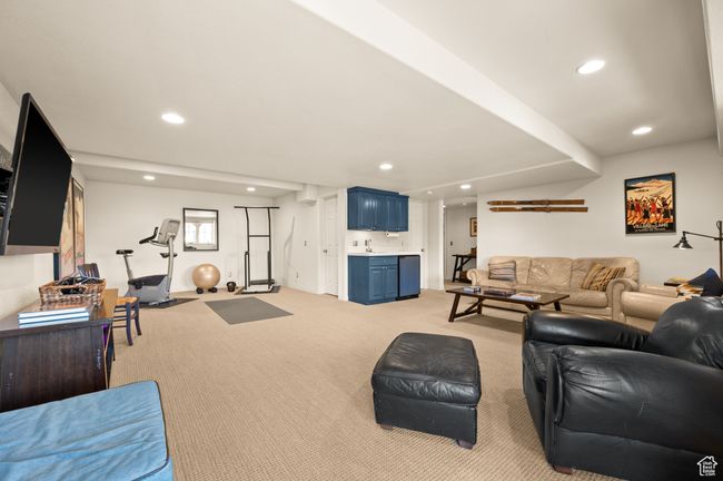 Living area with light carpet, and recessed lighting | Image 24