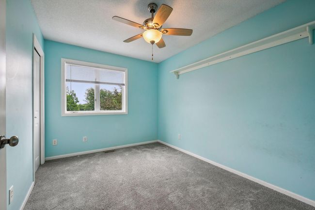 The walk in closet has a built in organizer | Image 18