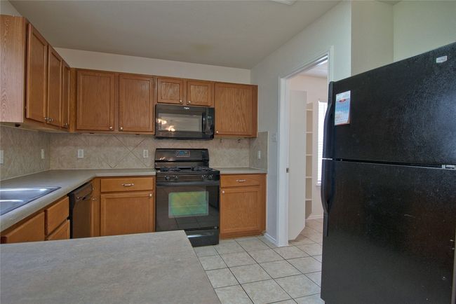115 Remington Dr, House other with 4 bedrooms, 3 bathrooms and 4 parking in Kyle TX | Image 11