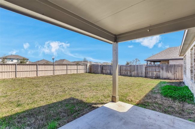 View of yard with a patio and a fenced backyard | Image 25