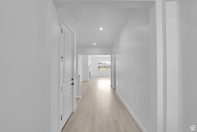 Corridor featuring recessed lighting, light wood finished floors, and baseboards | Image 6