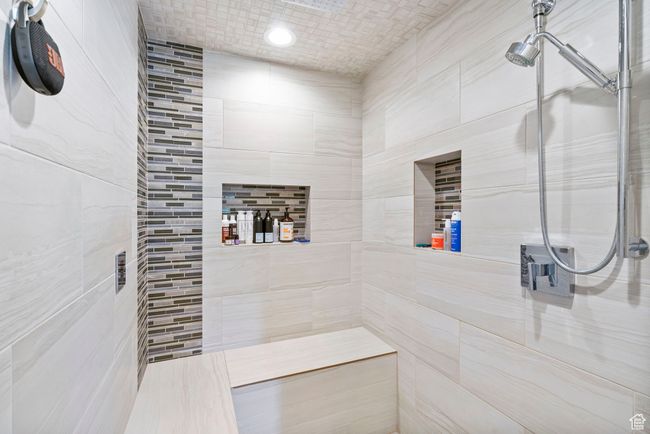 Bathroom featuring tiled shower | Image 38