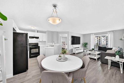 7205-304 Mackenzie Way Sw, Airdrie, AB, T4B3H7 | Card Image