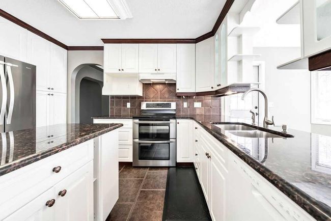 20 Mt Cascade Close Se, Home with 5 bedrooms, 3 bathrooms and 4 parking in Calgary AB | Image 16
