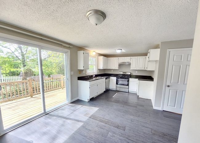 31 Harvard Ct, House other with 3 bedrooms, 2 bathrooms and 2 parking in Dracut MA | Image 11
