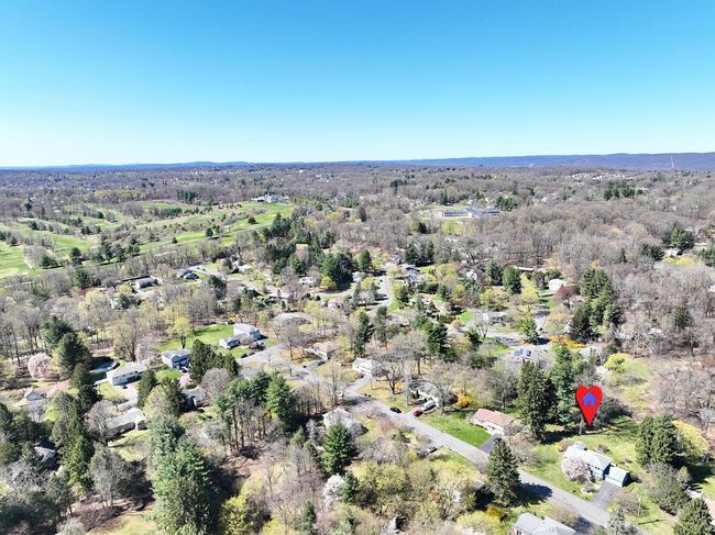 Birds eye view of property featuring a forest view | Image 40